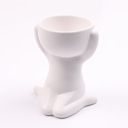 Humanoid ceramic flower pot